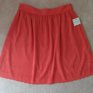 NWT Madison orange tangerine skirt size 12 with pockets.